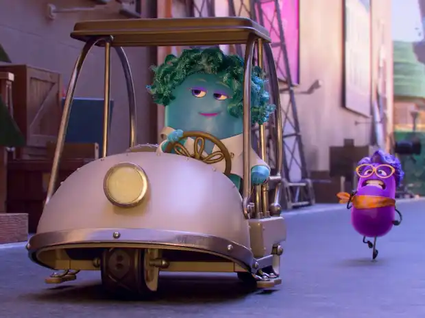 Director Paula Persimmon running after the studio boss in Dream Productions.